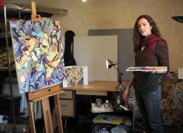 Virginia Moore works in her studio at the Lander Art Center.